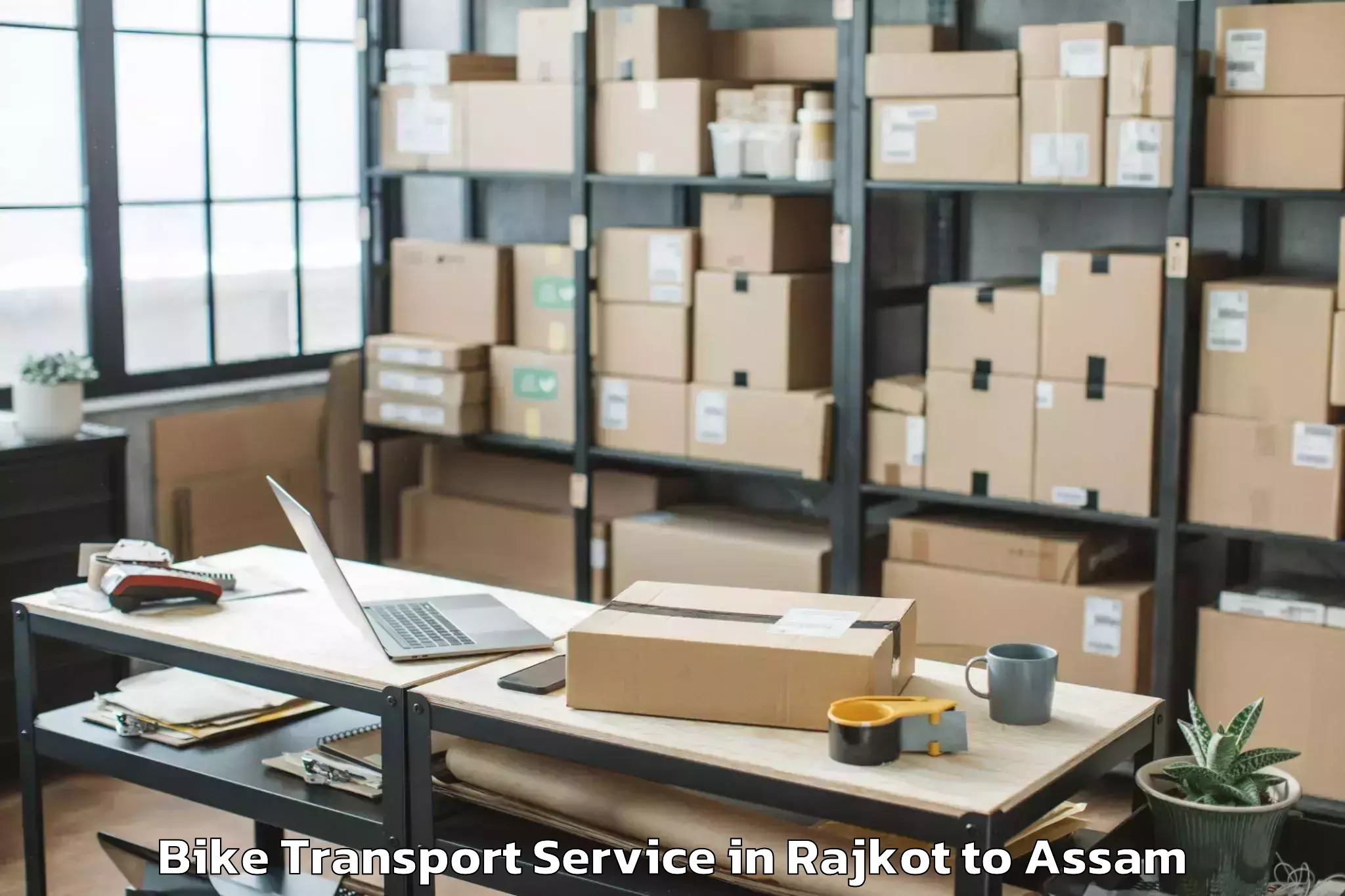 Professional Rajkot to Amguri Bike Transport